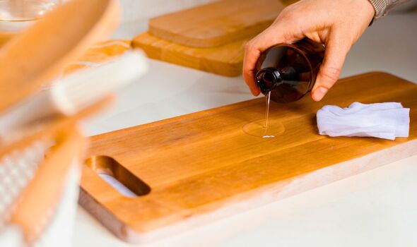 Picture of someone using teak oil