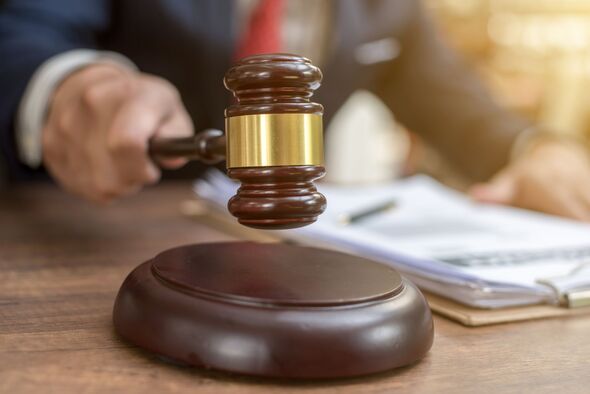 Close up lawyer businessman working or reading lawbook in office workplace for consultant lawyer con