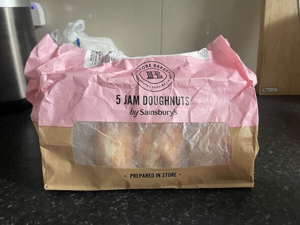 Sainsburys donuts against a dark background