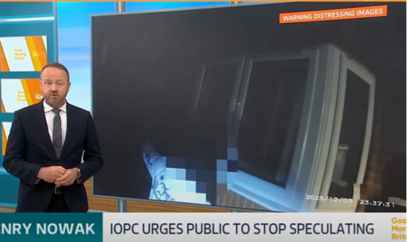 GMB presenter in a suit showing bodycam footage