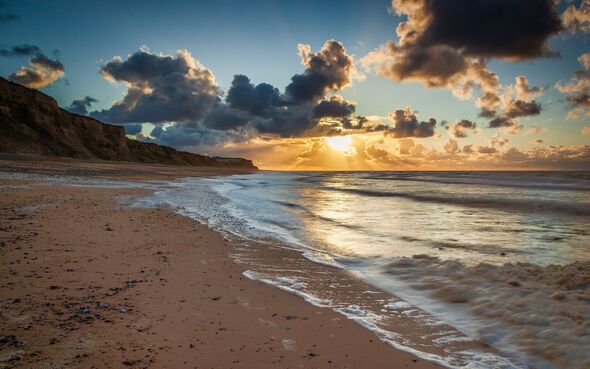 Scenic view of beach against sky during sunset,Cromer,United Kingdom,UK