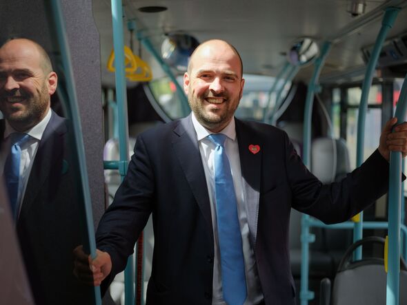 Richard Holden on a bus
