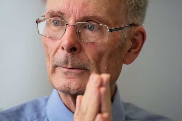 Sir John Curtice with hands clasped