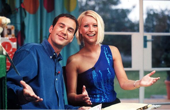 Johnny Vaughan and Denise Van Outen smile